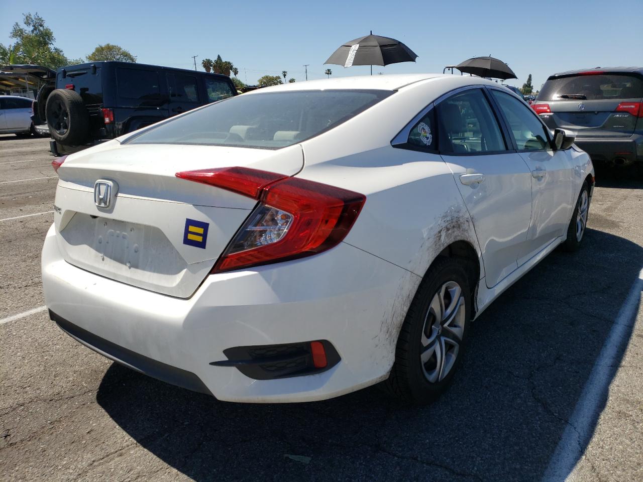 Photo 4 from auction – 2017 HONDA CIVIC LX with VIN 2HGFC2F52HH513047