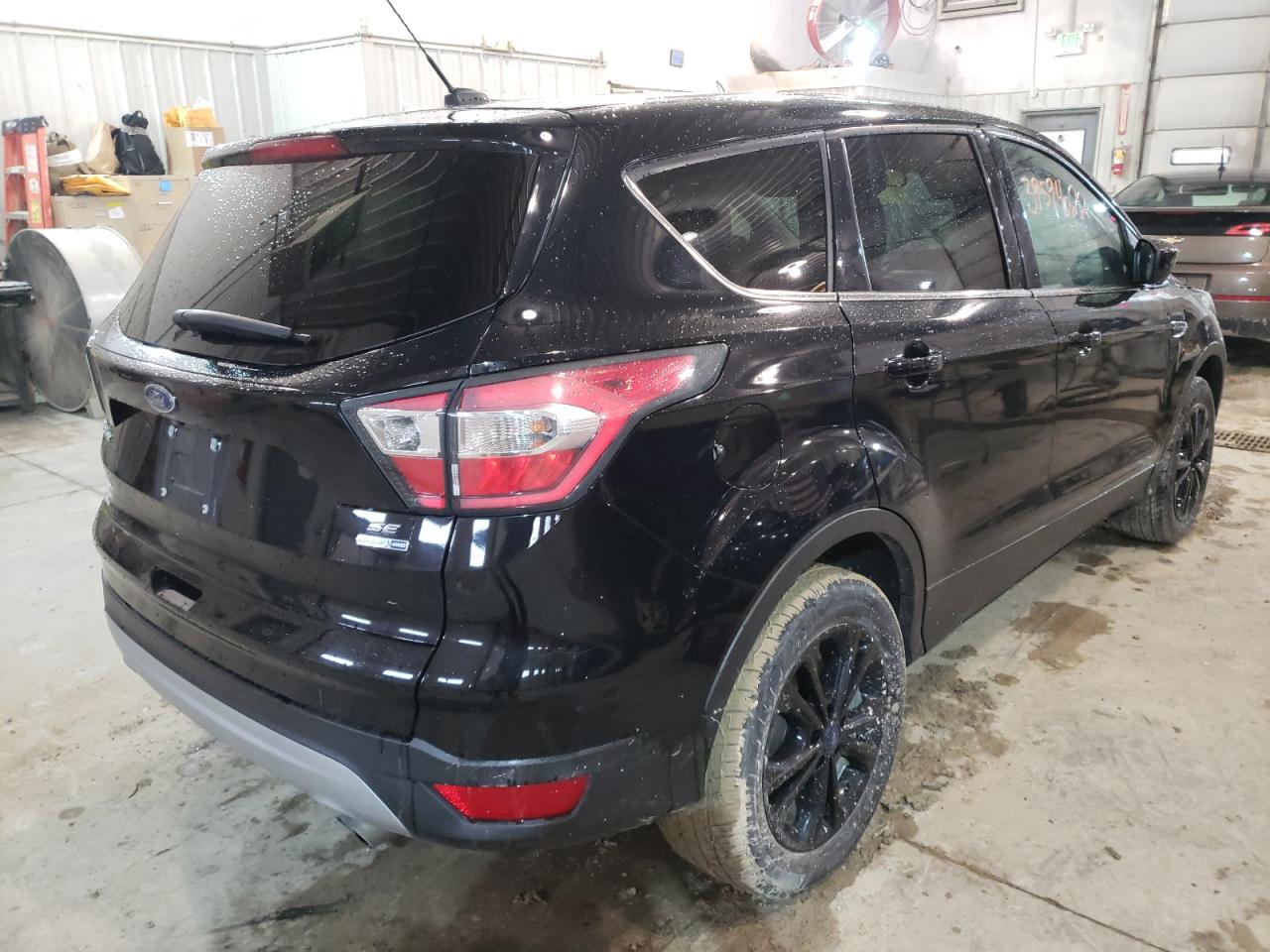 Photo 4 from auction – 2017 FORD ESCAPE SE with VIN 1FMCU9G94HUB04663