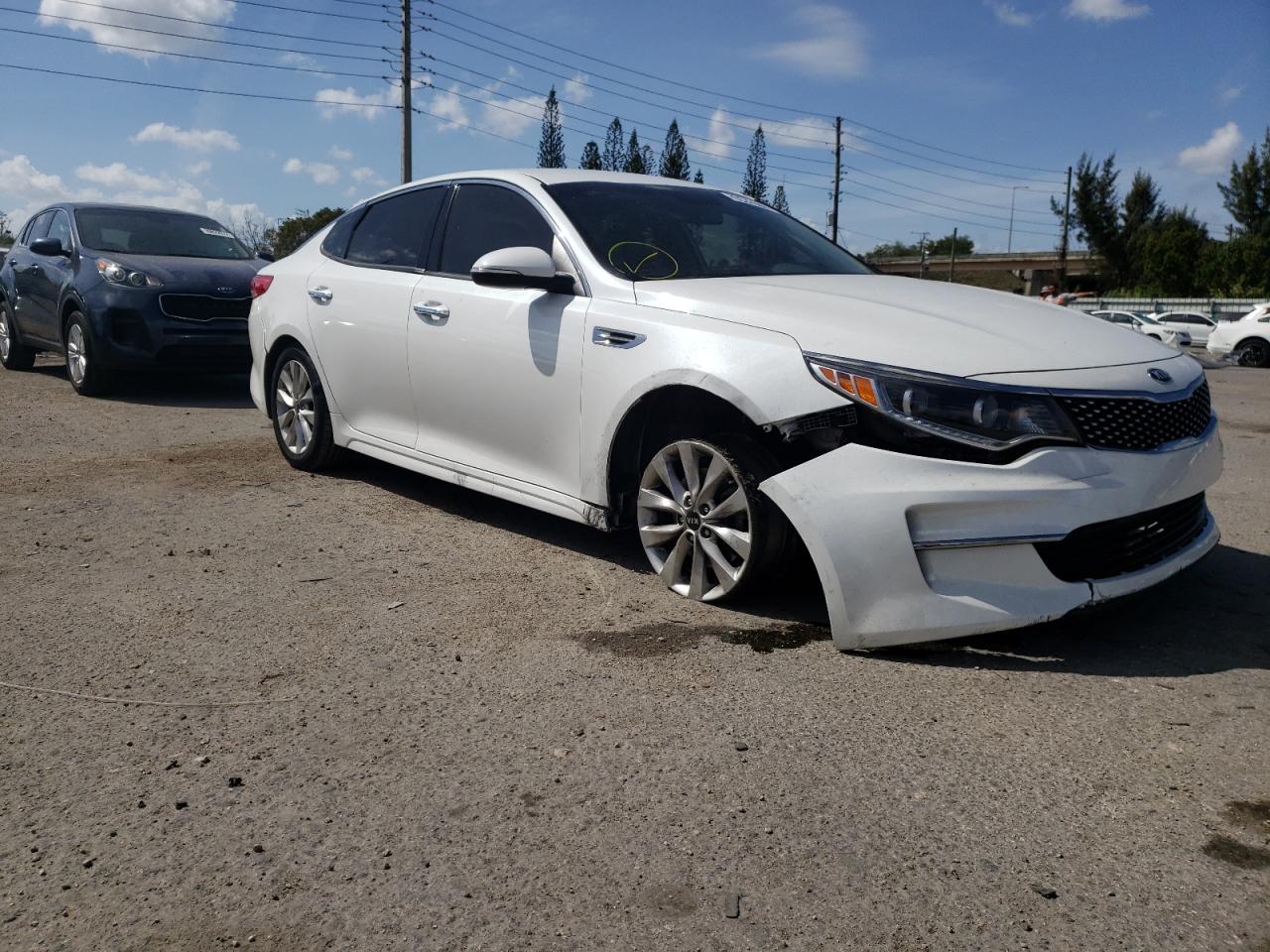 KIA OPTIMA EX 2016 with VIN 5XXGU4L30GG055315 - Photo from auction