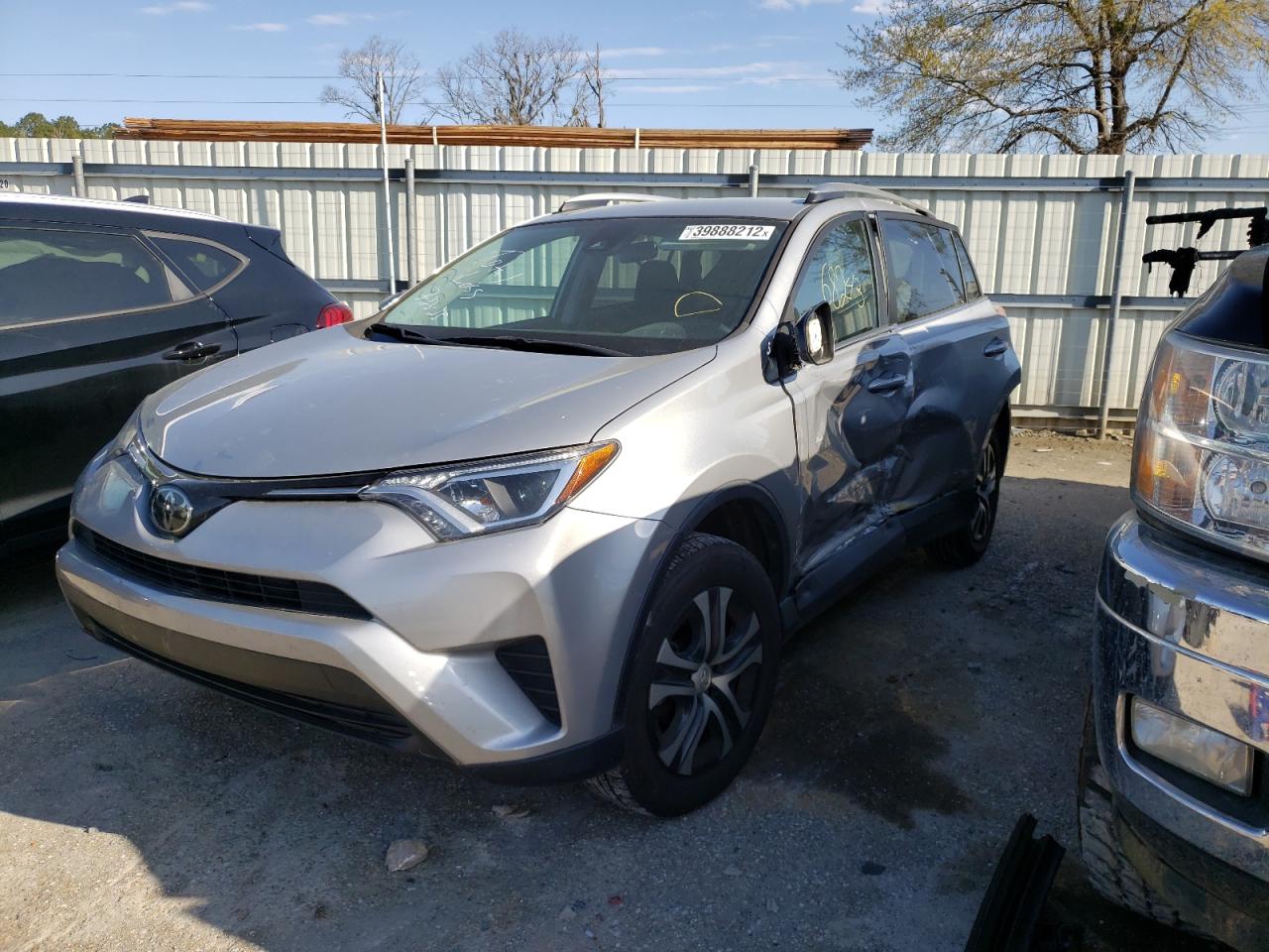 Photo 2 from auction – 2018 TOYOTA RAV4 LE with VIN 2T3ZFREV2JW466850