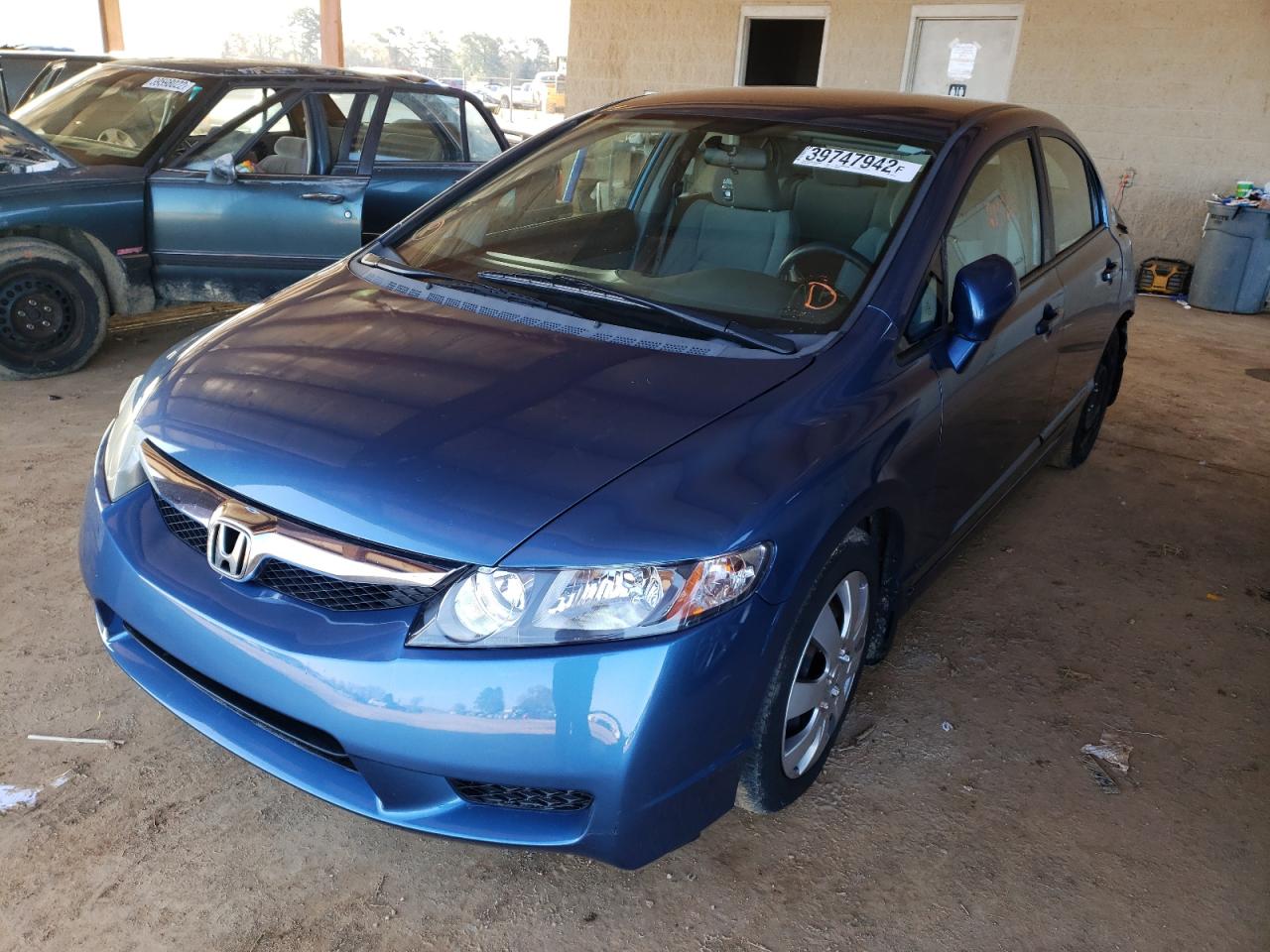 Photo 2 from auction – 2010 HONDA CIVIC LX with VIN 19XFA1F54AE001144