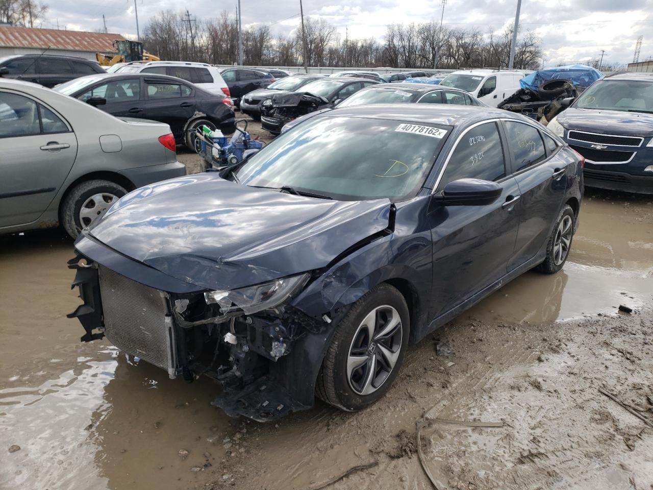 Photo 2 from auction – 2019 HONDA CIVIC LX with VIN 19XFC2F61KE000060