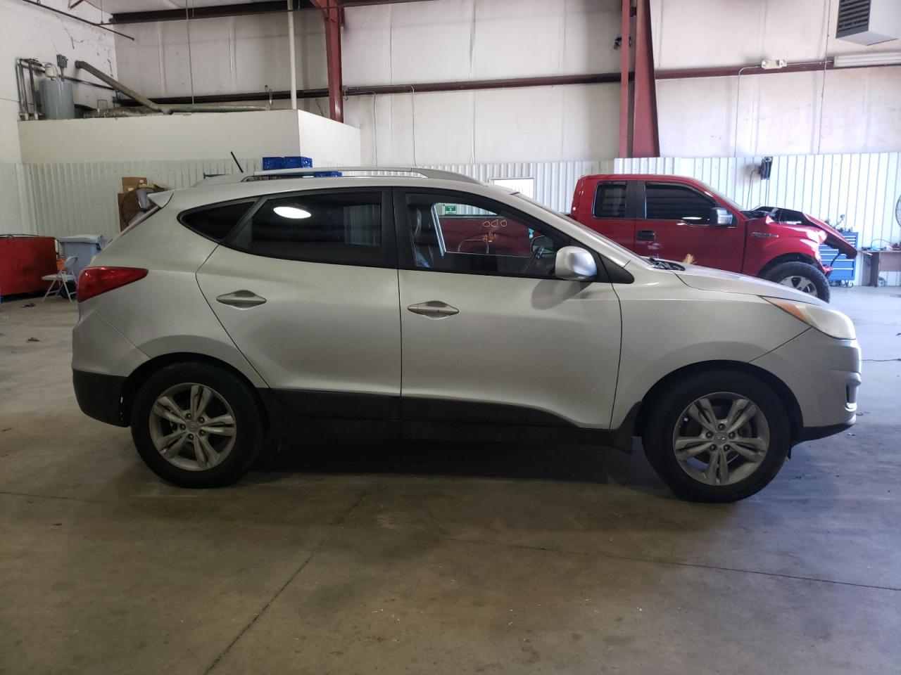 Photo 9 from auction – 2011 HYUNDAI TUCSON GLS with VIN KM8JUCAC0BU148501