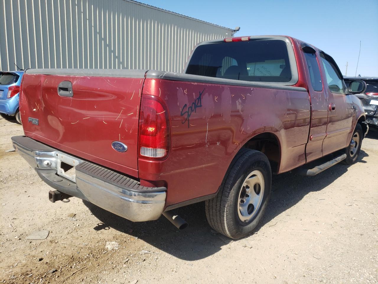Photo 4 from auction – 1999 FORD F150 with VIN 1FTRX17W2XKB94757