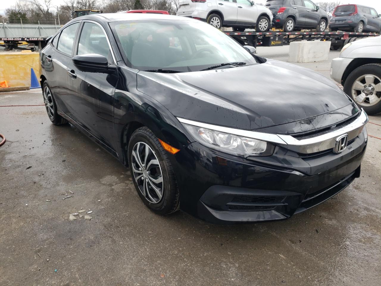 HONDA CIVIC LX 2017 with VIN 19XFC2F50HE063974 - Photo from auction