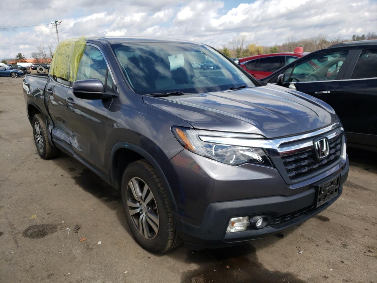 HONDA RIDGELINE 2017 with VIN 5FPYK3F42HB022076 - Photo from auction