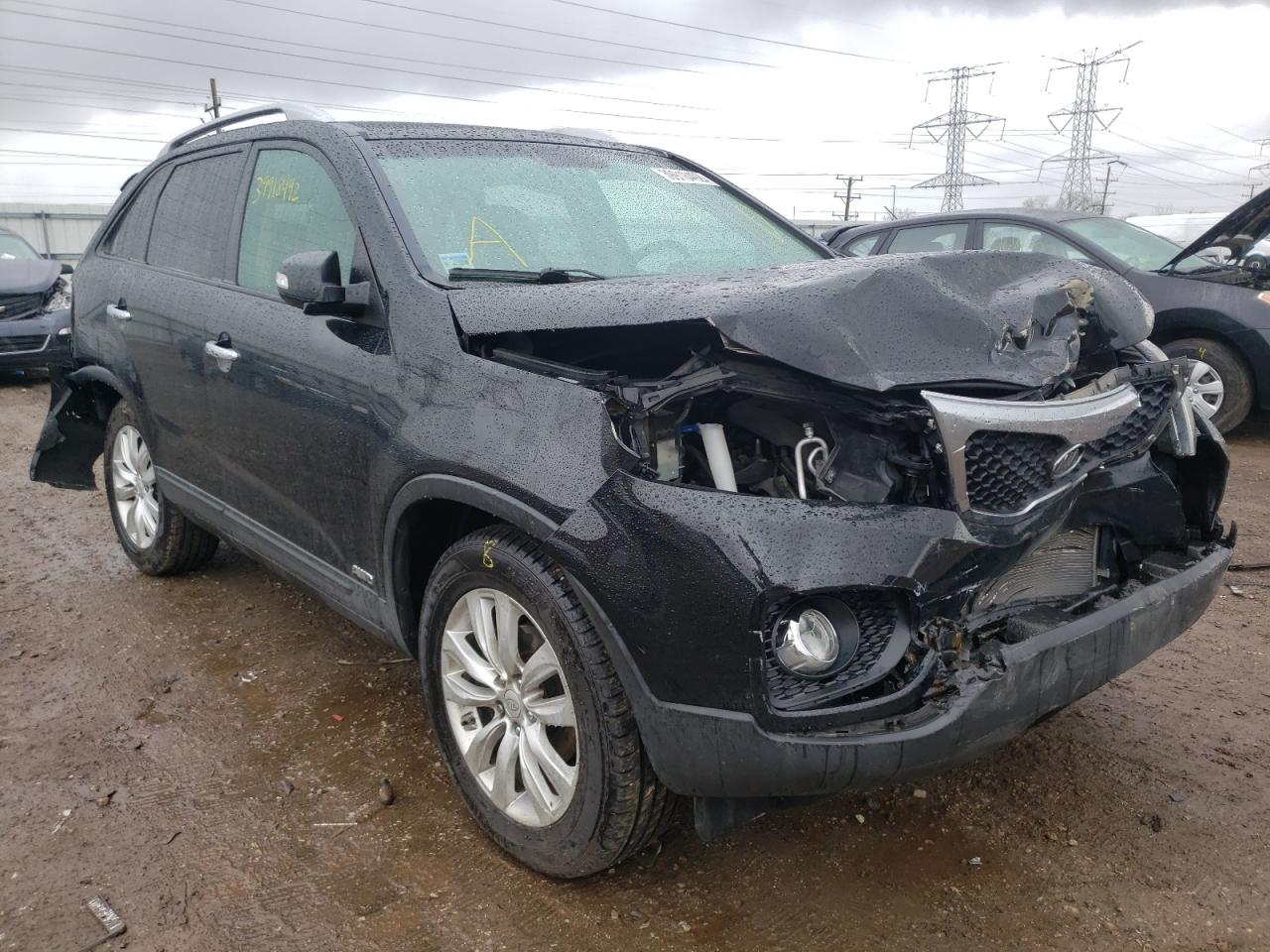 KIA SORENTO EX 2011 with VIN 5XYKUDA20BG103808 - Photo from auction