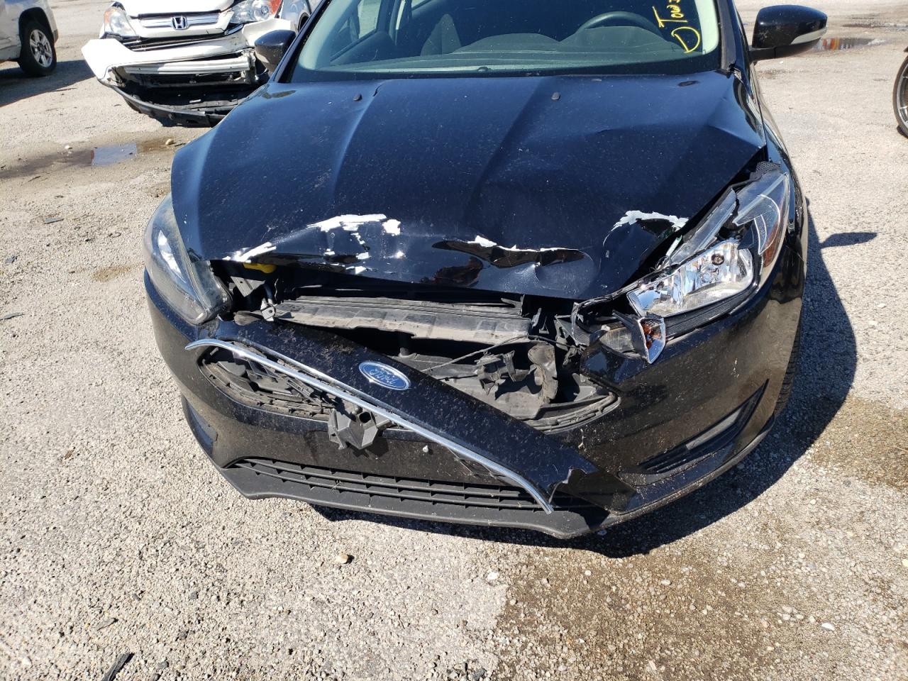 Photo 9 from auction – 2017 FORD FOCUS SEL with VIN 1FADP3M29HL248886