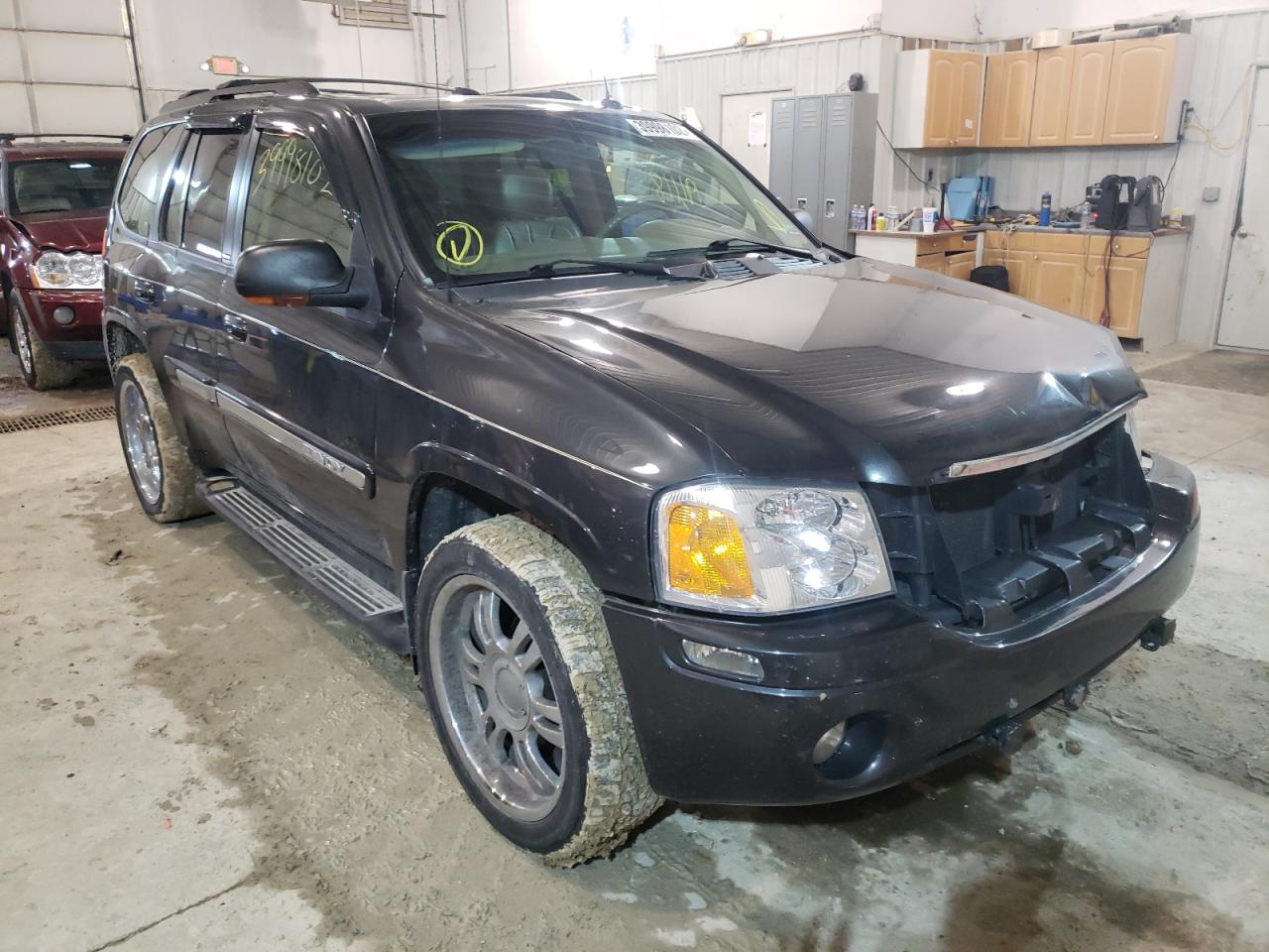 GMC ENVOY 2004 with VIN 1GKDT13S342148136 - Photo from auction