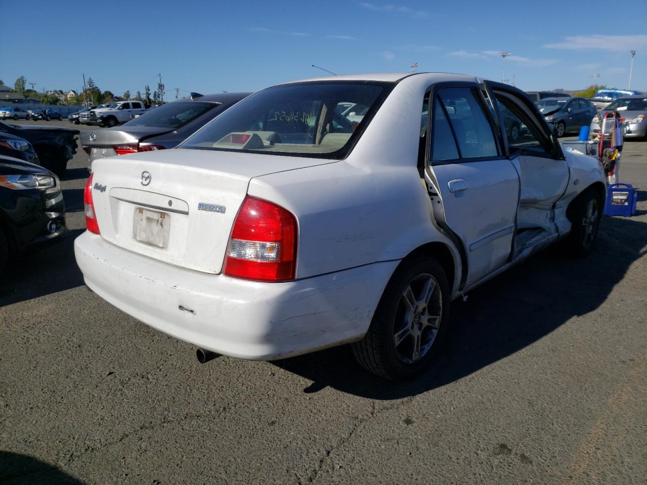 Photo 4 from auction – 2003 MAZDA PROTEGE DX with VIN JM1BJ225230200201