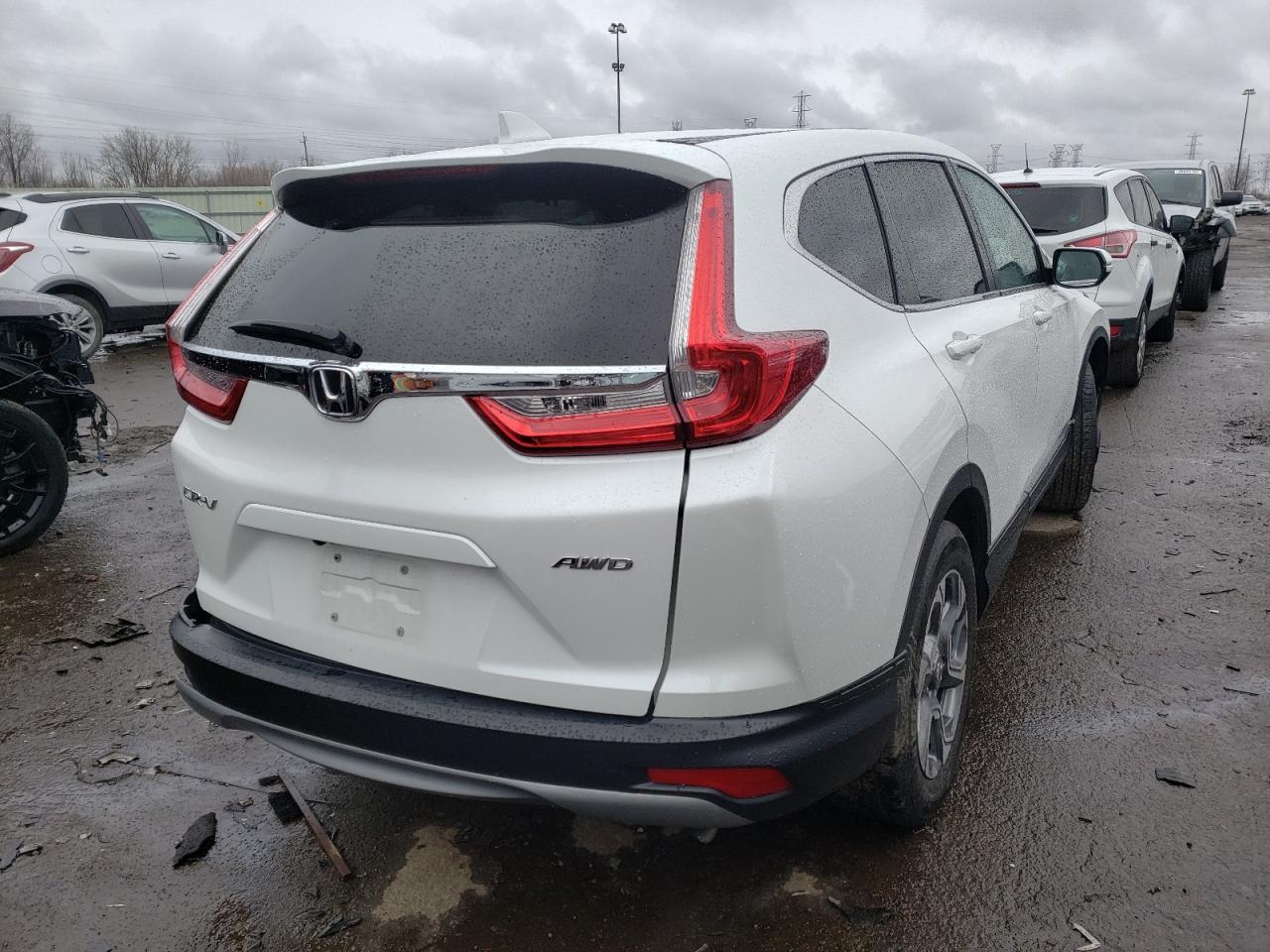 Photo 4 from auction – 2019 HONDA CR-V EX with VIN 2HKRW2H53KH666843