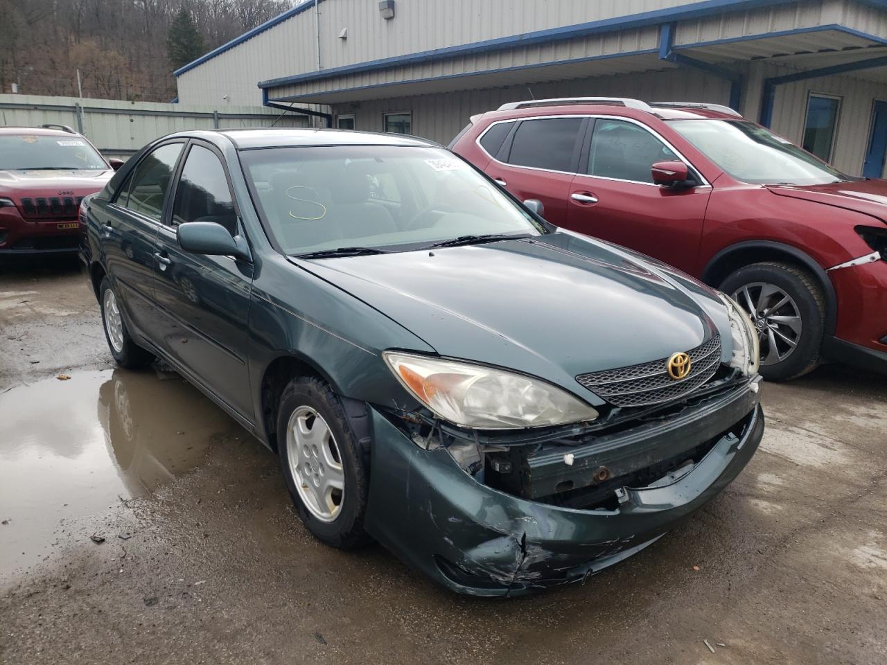 TOYOTA CAMRY LE 2002 with VIN JTDBE32K220028508 - Photo from auction