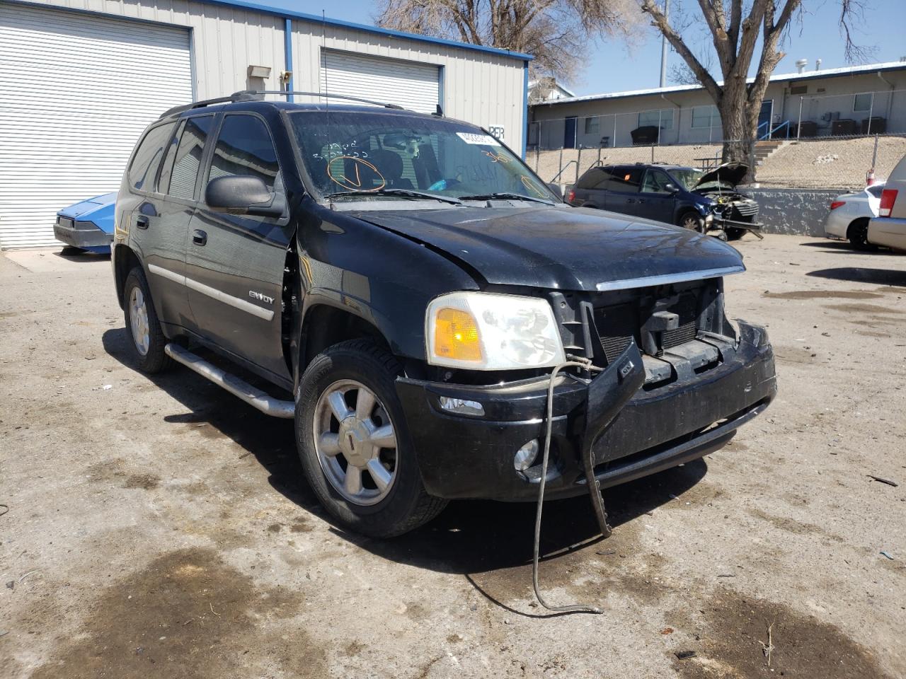 GMC ENVOY 2006 with VIN 1GKDS13SX62228975 - Photo from auction