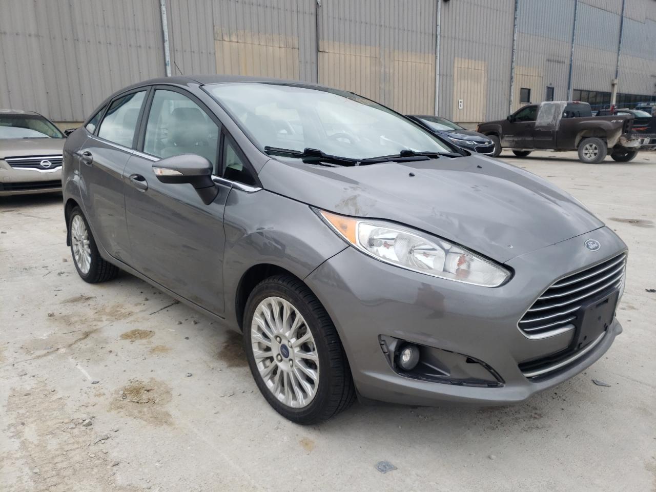 FORD FIESTA TIT 2014 with VIN 3FADP4CJ4EM233348 - Photo from auction