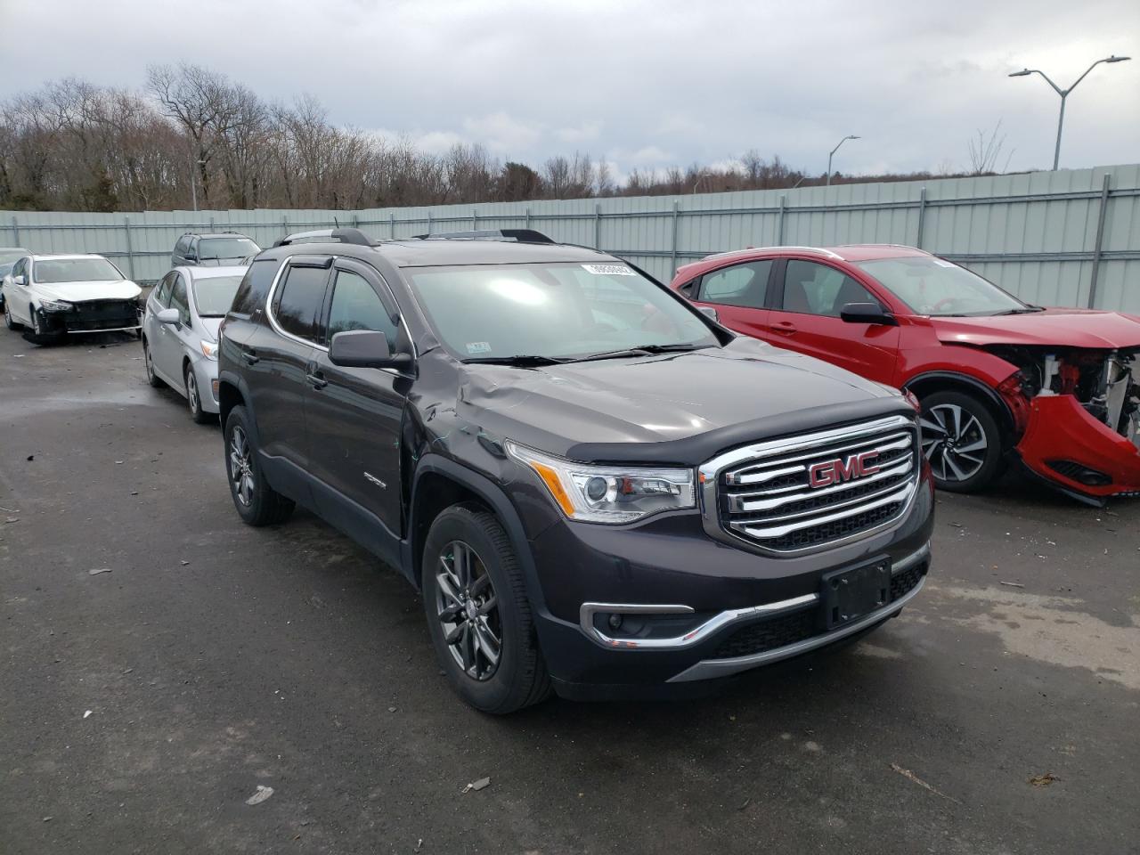 GMC ACADIA SLT 2017 with VIN 1GKKNULS1HZ275547 - Photo from auction