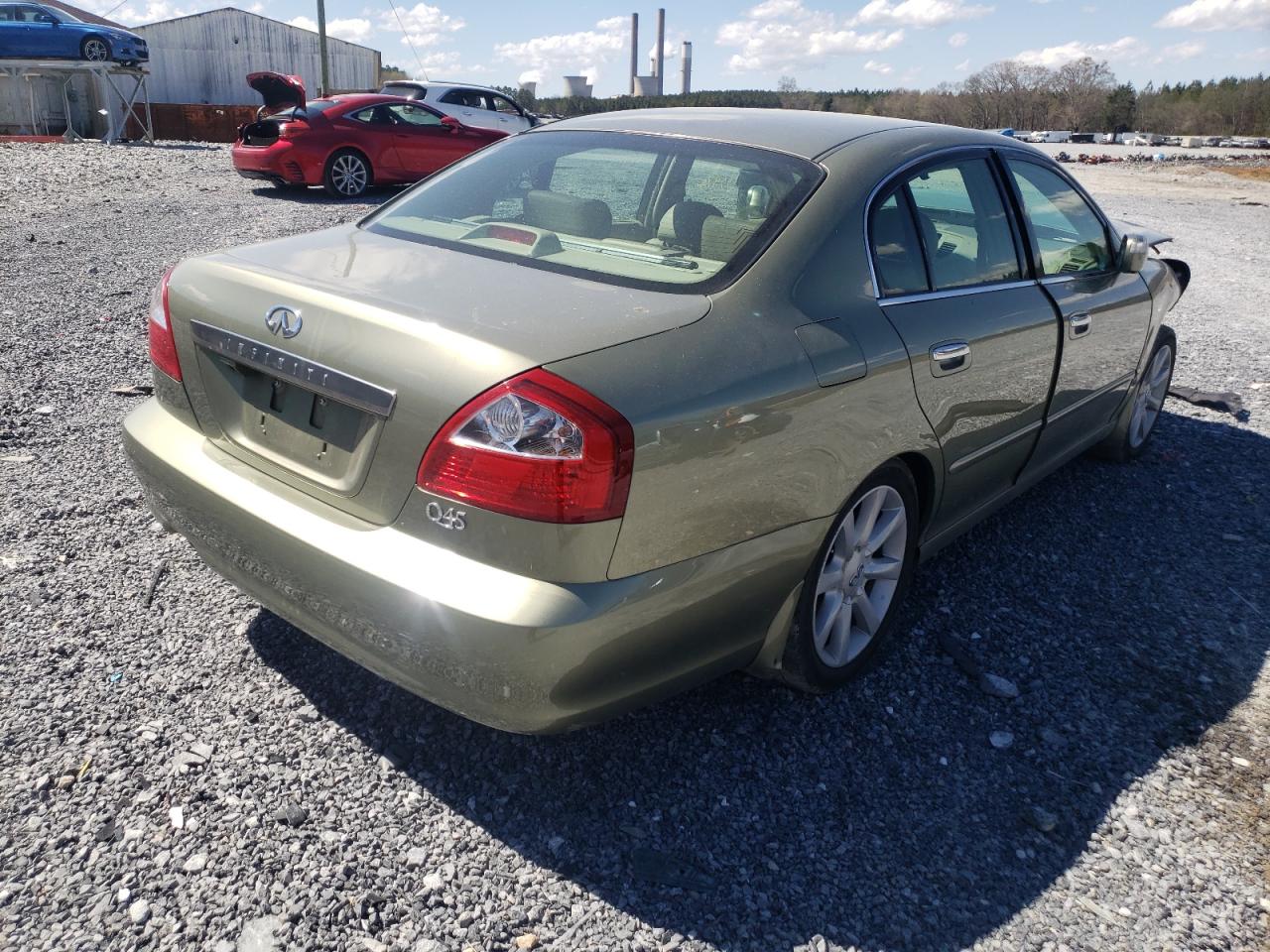 Photo 4 from auction – 2002 INFINITI Q45 with VIN JNKBF01A92M001463