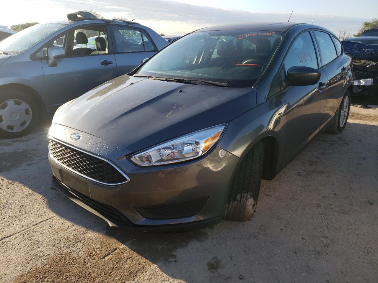 Photo 2 from auction – 2018 FORD FOCUS SE with VIN 1FADP3K26JL234582
