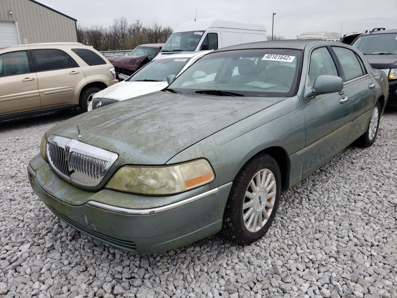 Photo 2 from auction – 2004 LINCOLN TOWN CAR E with VIN 1LNHM81W04Y616616