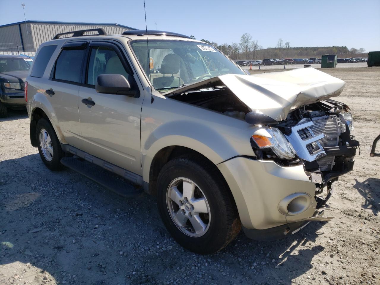 FORD ESCAPE 2011 with VIN 1FMCU0D79BKC47741 - Photo from auction