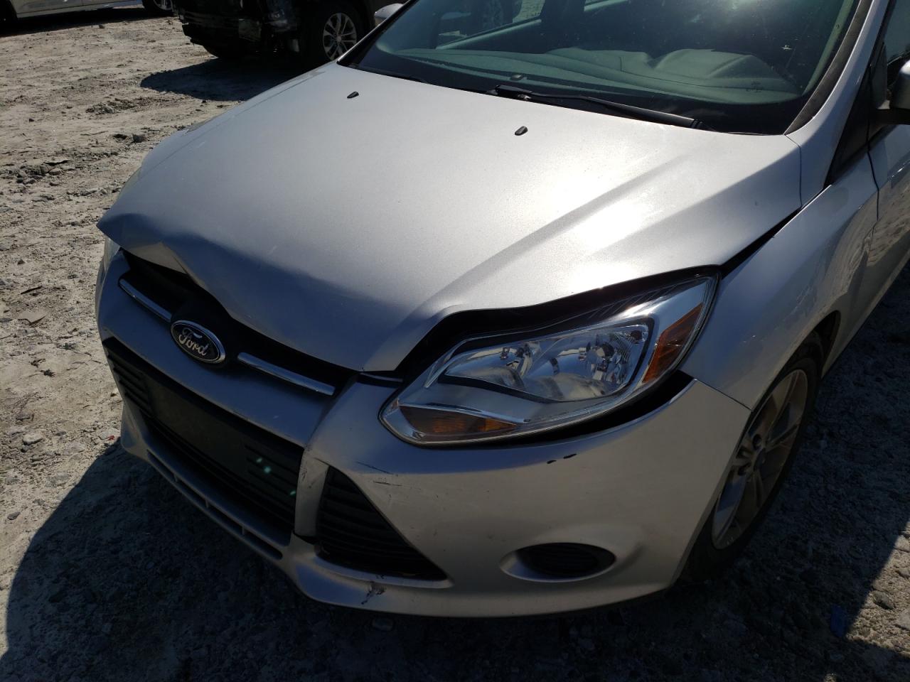 Photo 9 from auction – 2014 FORD FOCUS SE with VIN 1FADP3F27EL103127