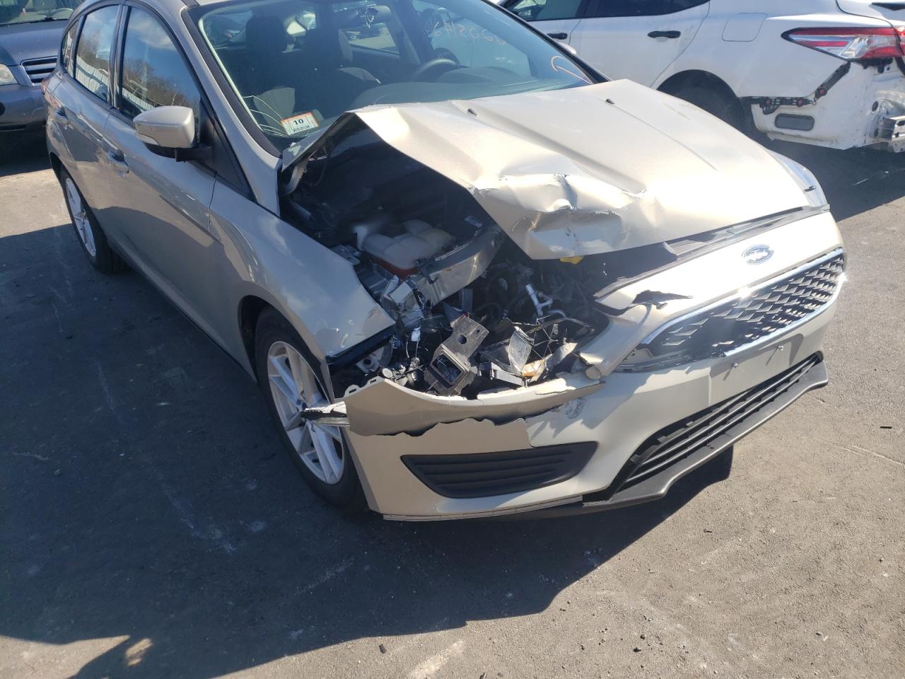 Photo 9 from auction – 2015 FORD FOCUS SE with VIN 1FADP3K29FL213040