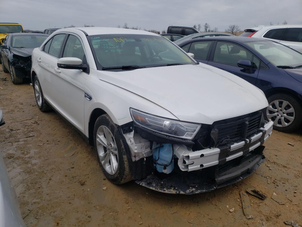 FORD TAURUS SEL 2014 with VIN 1FAHP2E83EG169877 - Photo from auction