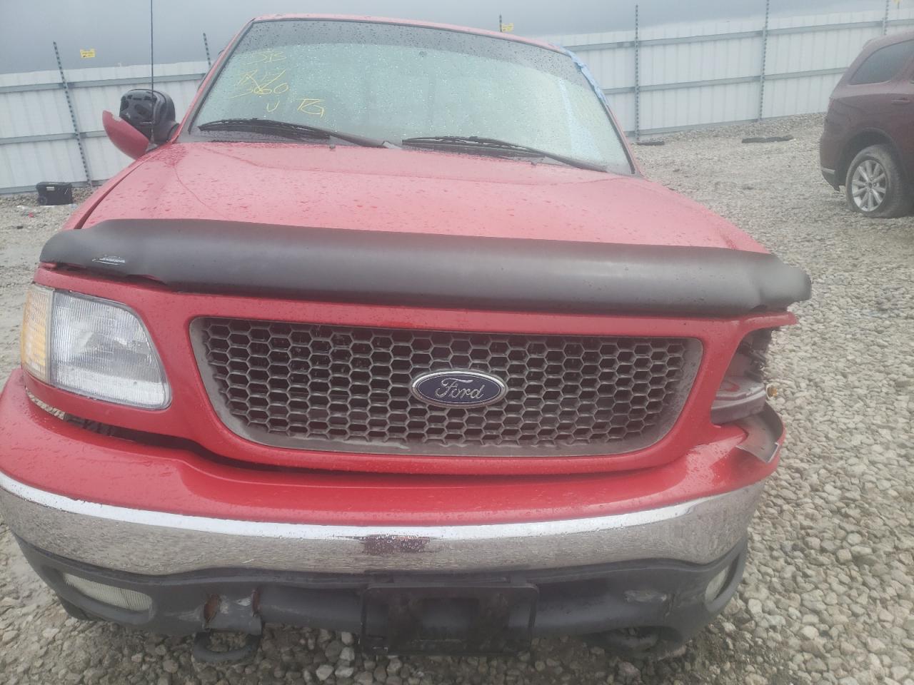 Photo 7 from auction – 2000 FORD F150 with VIN 1FTRX18L5YNA59860