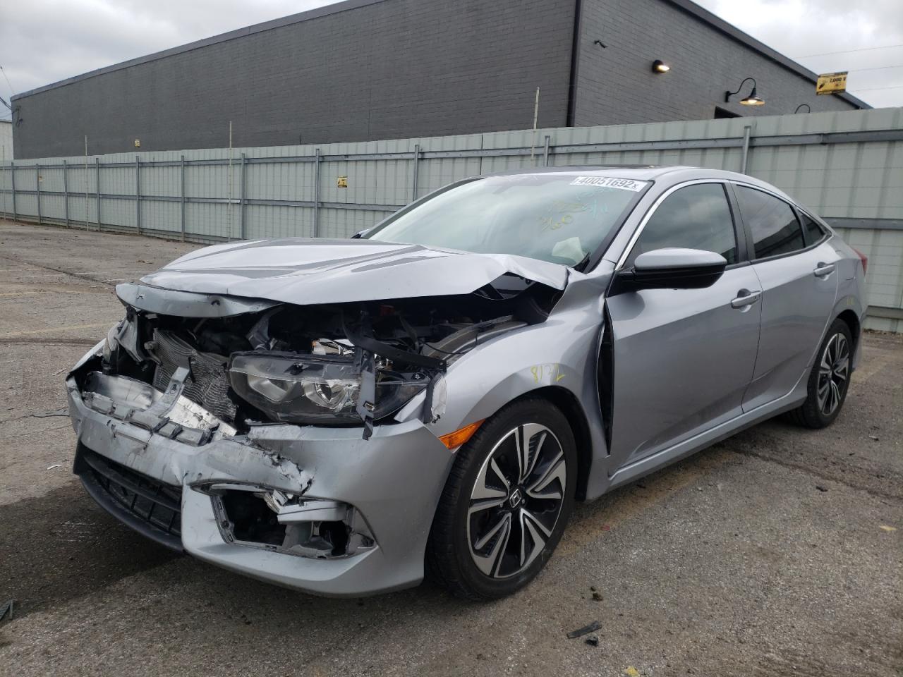 Photo 2 from auction – 2016 HONDA CIVIC EX with VIN 19XFC1F32GE011334
