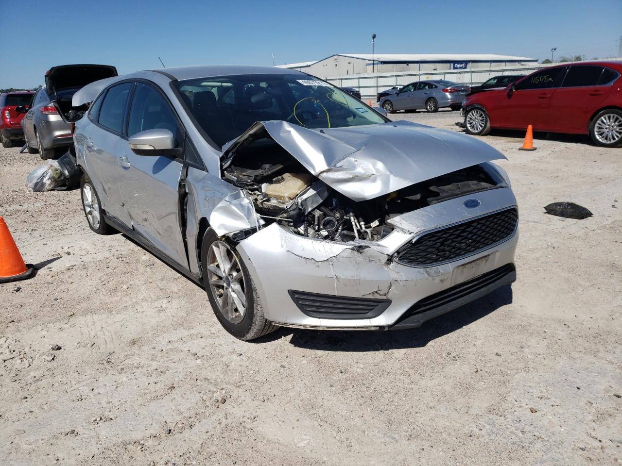 FORD FOCUS SE 2016 with VIN 1FADP3F23GL387343 - Photo from auction