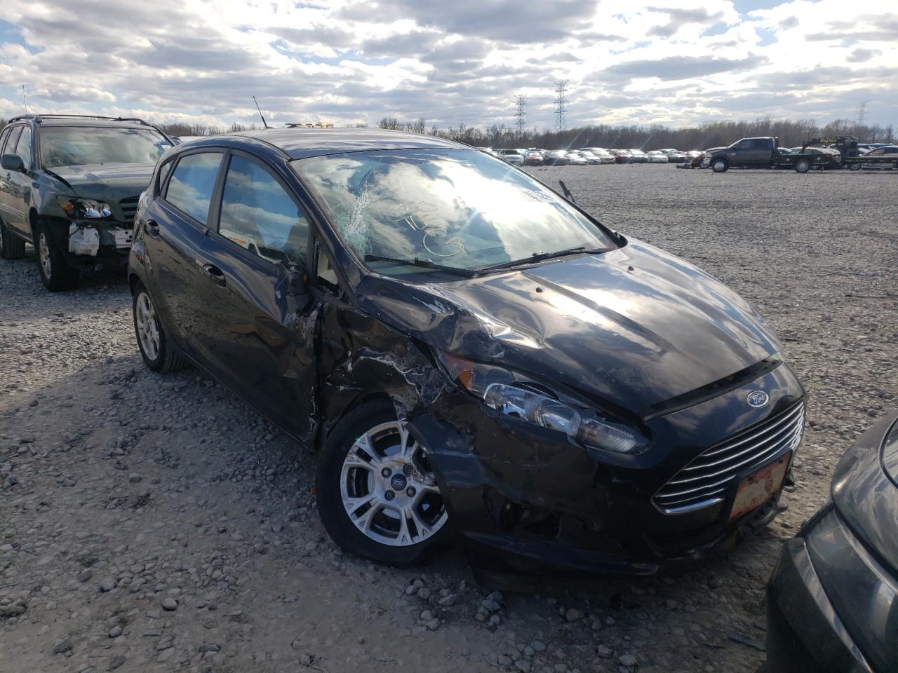 FORD FIESTA SE 2014 with VIN 3FADP4EJ7EM107384 - Photo from auction