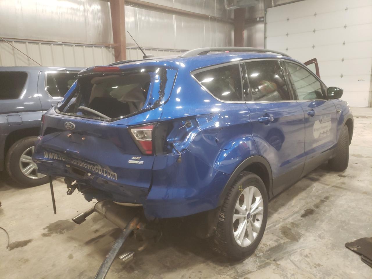 Photo 4 from auction – 2017 FORD ESCAPE SE with VIN 1FMCU9GD3HUC08095
