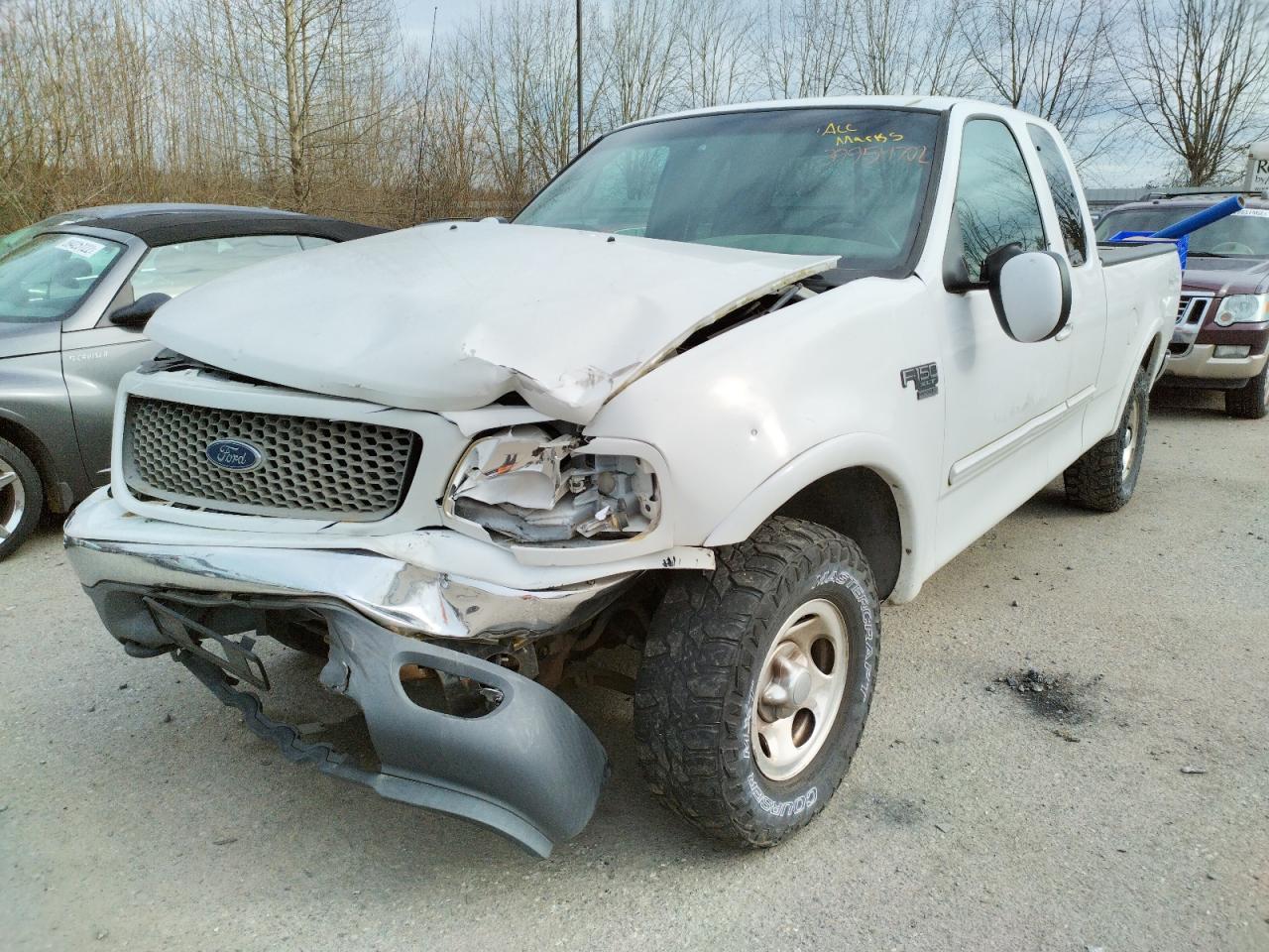 Photo 2 from auction – 2000 FORD F150 with VIN 1FTRX18L8YNC14806