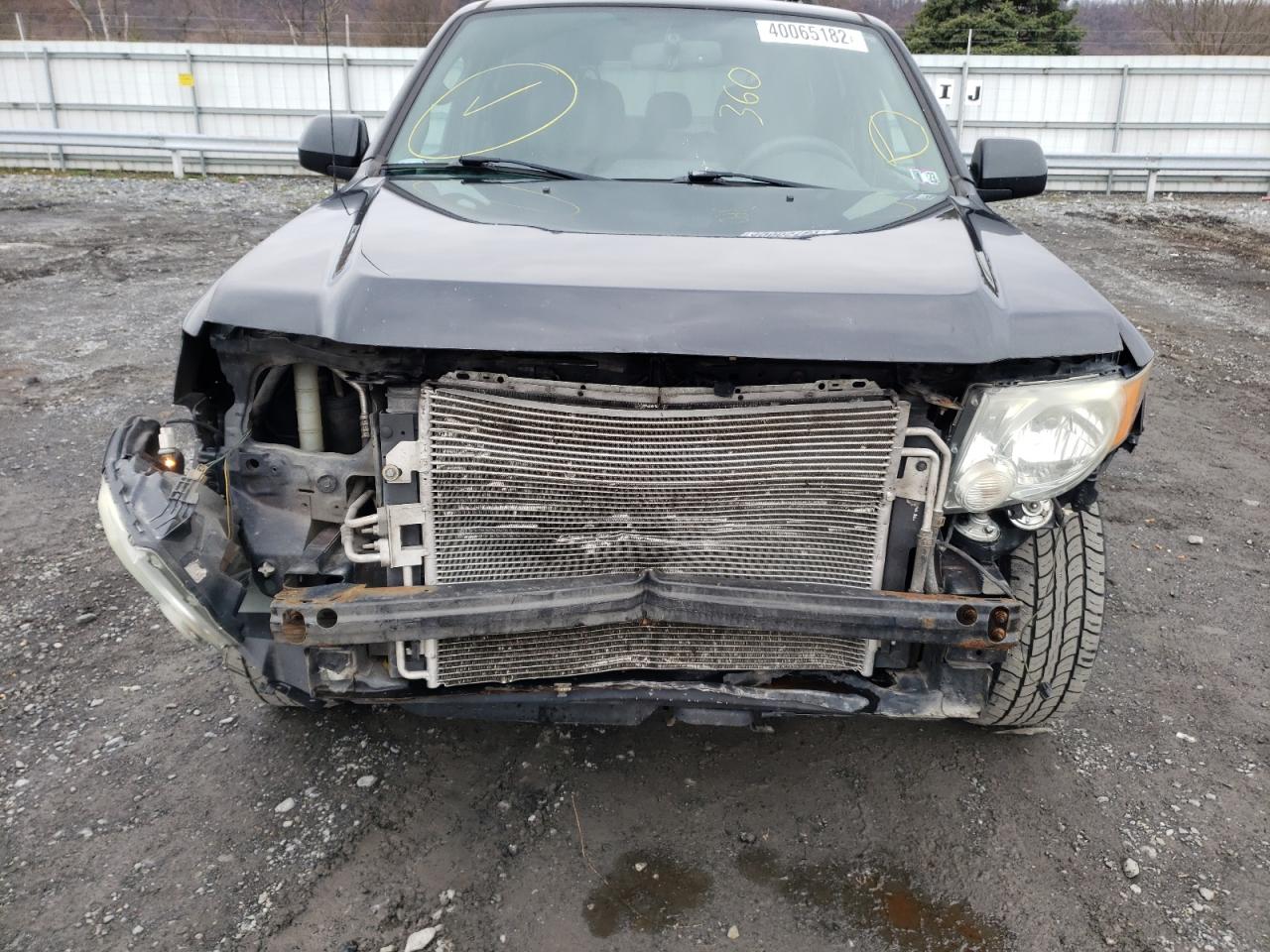 Photo 9 from auction – 2011 FORD ESCAPE LIM with VIN 1FMCU9EG3BKB79018