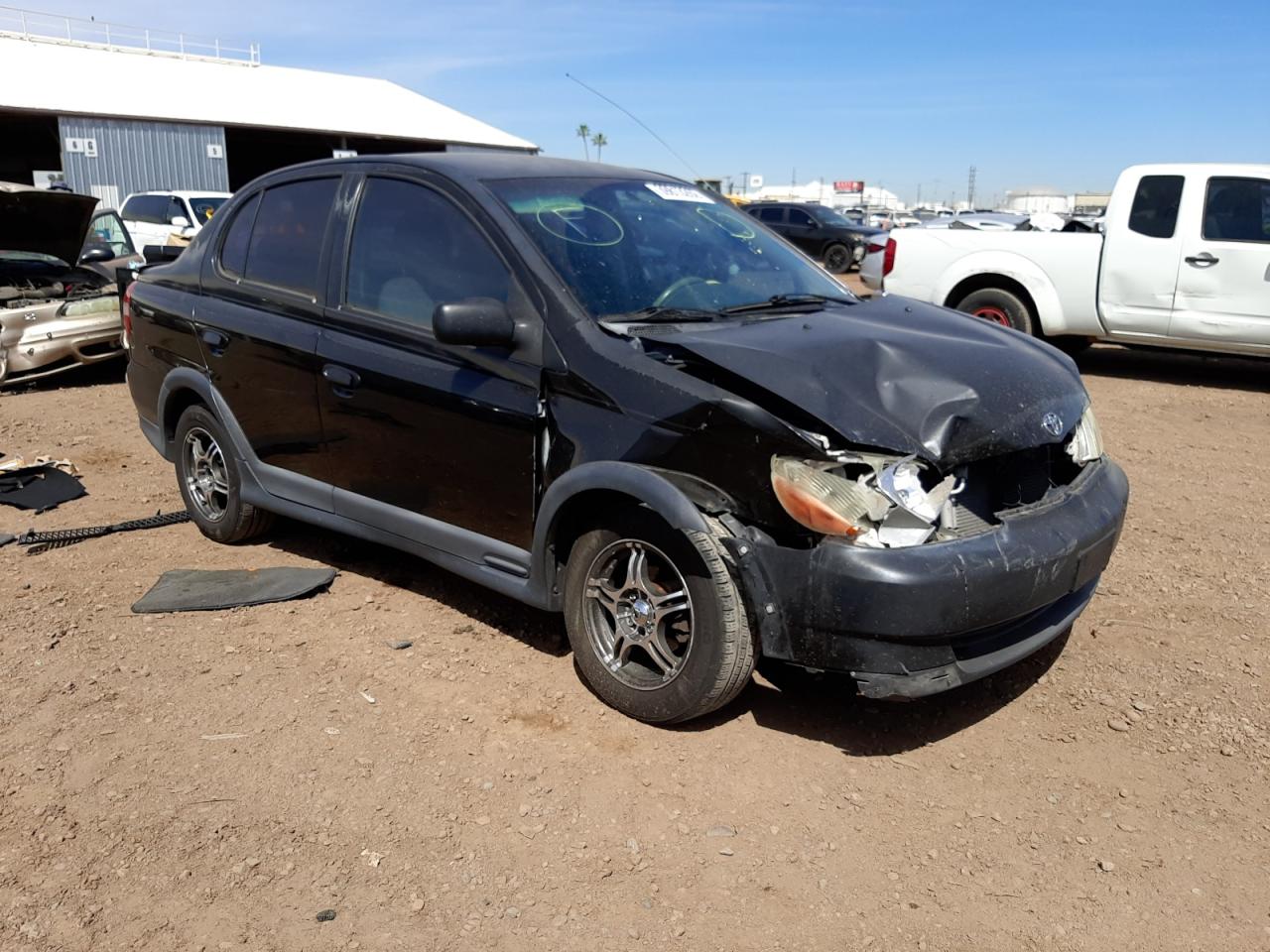 TOYOTA ECHO 2000 with VIN JTDBT1231Y0021464 - Photo from auction