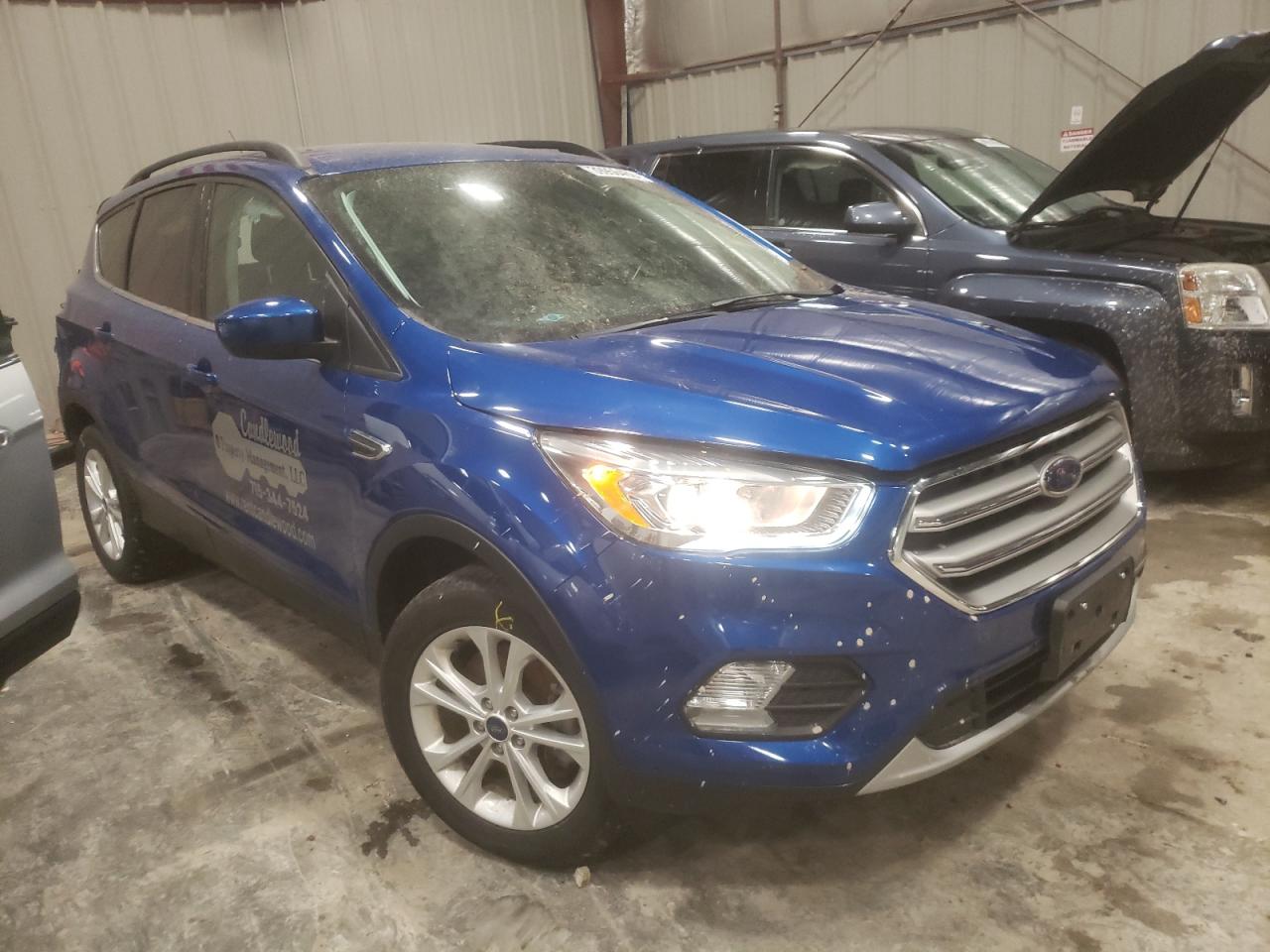 FORD ESCAPE SE 2017 with VIN 1FMCU9GD3HUC08095 - Photo from auction