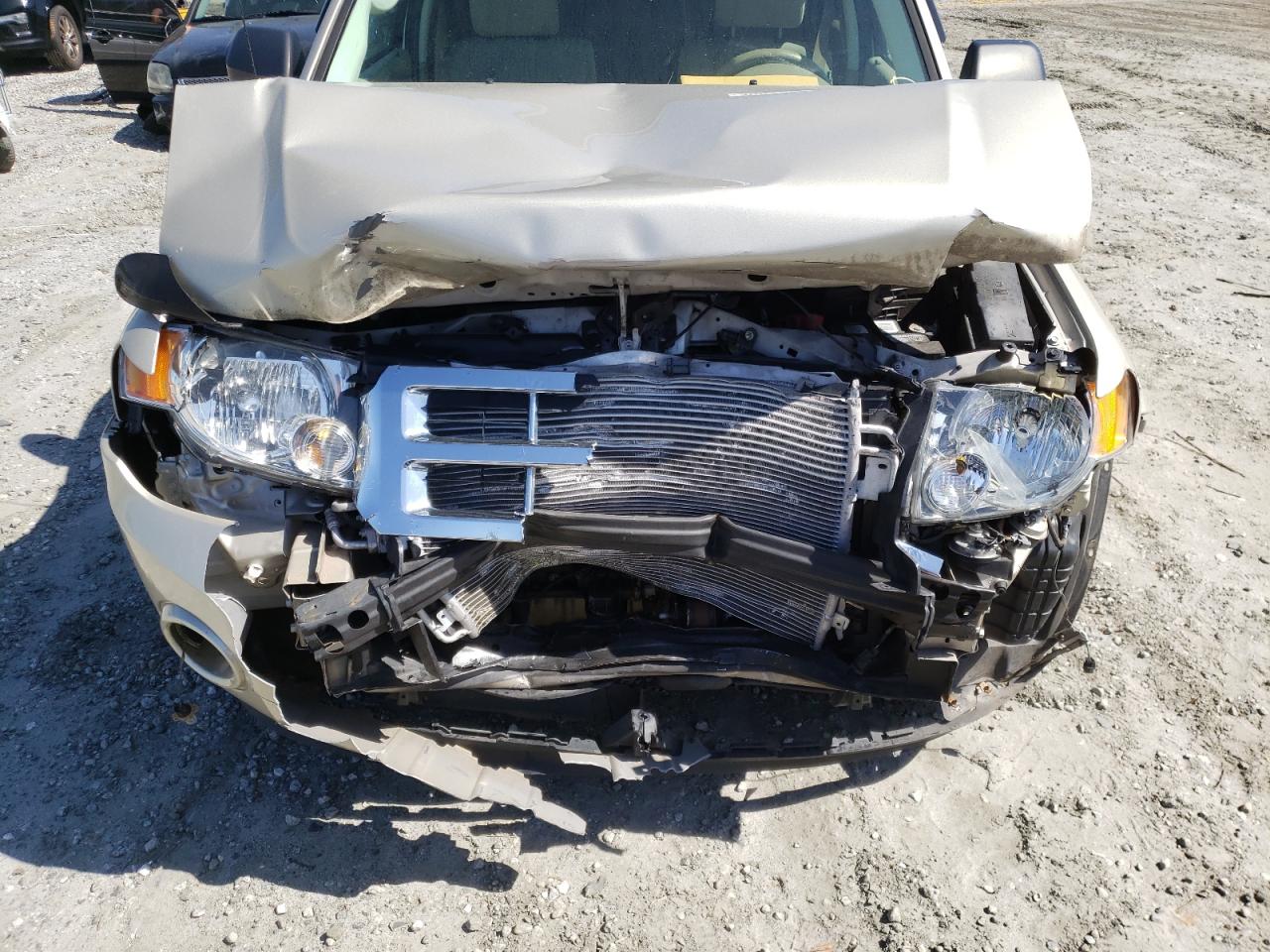 Photo 9 from auction – 2011 FORD ESCAPE with VIN 1FMCU0D79BKC47741