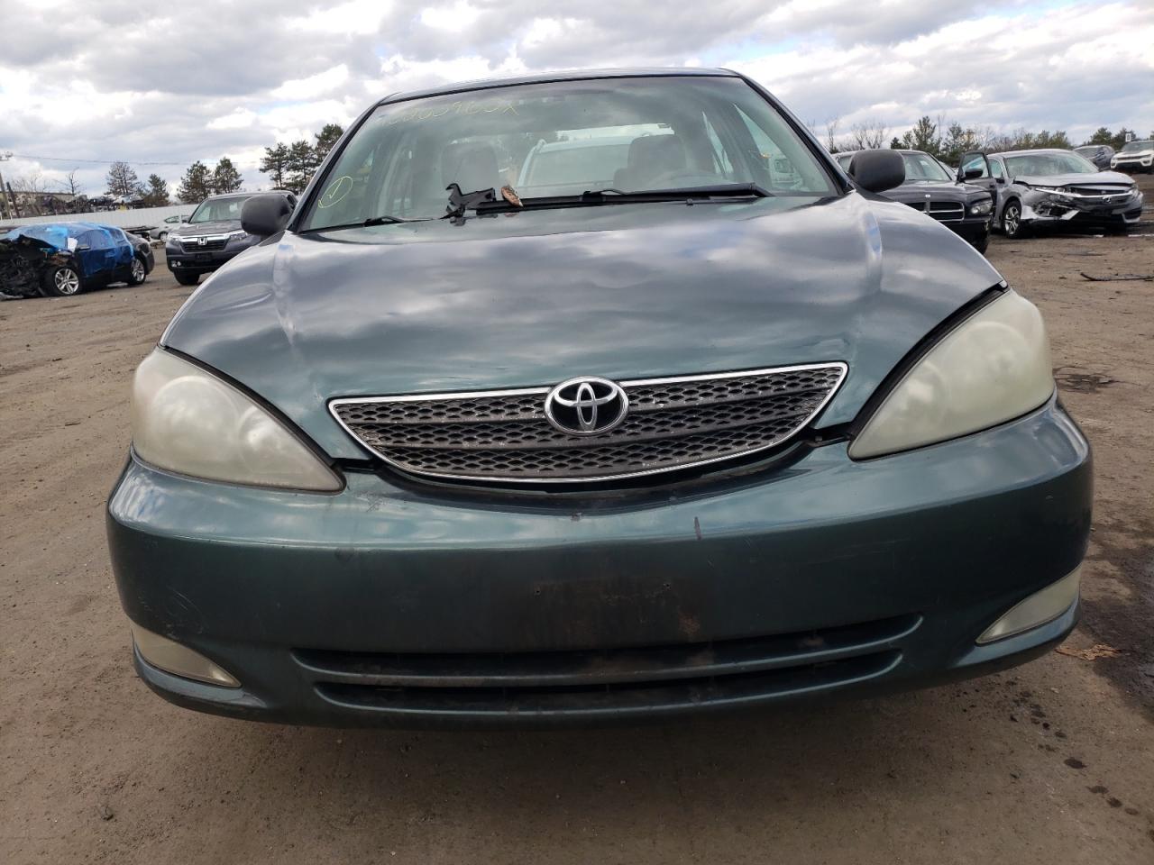 Photo 9 from auction – 2004 TOYOTA CAMRY LE with VIN 4T1BE32KX4U263360