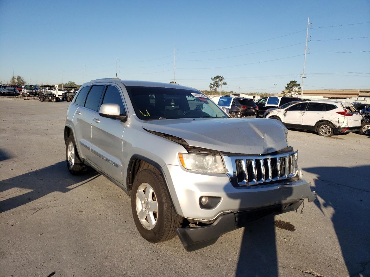 JEEP GRAND CHER 2011 with VIN 1J4RR4GG8BC654618 - Photo from auction