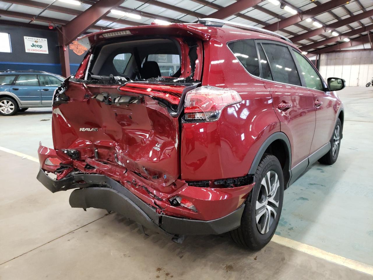 Photo 4 from auction – 2018 TOYOTA RAV4 LE with VIN JTMBFREV9JD232171