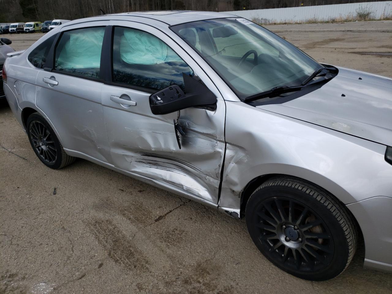 Photo 9 from auction – 2011 FORD FOCUS SES with VIN 1FAHP3GN8BW184160