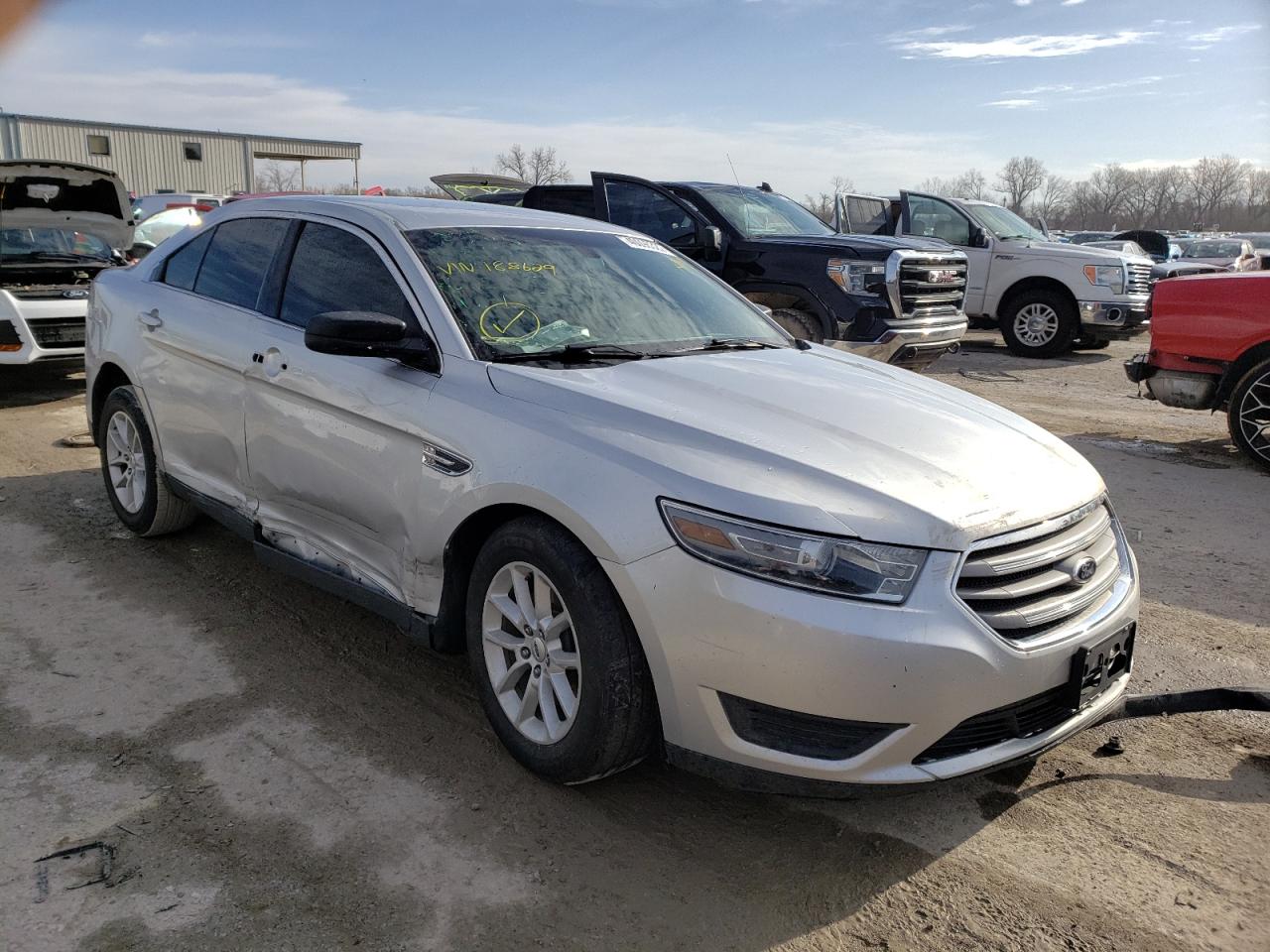 FORD TAURUS SE 2013 with VIN 1FAHP2D82DG188629 - Photo from auction