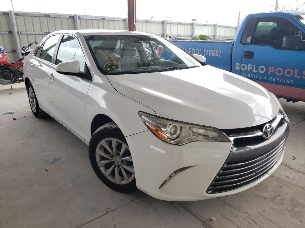 TOYOTA CAMRY LE 2017 with VIN 4T1BF1FKXHU357756 - Photo from auction