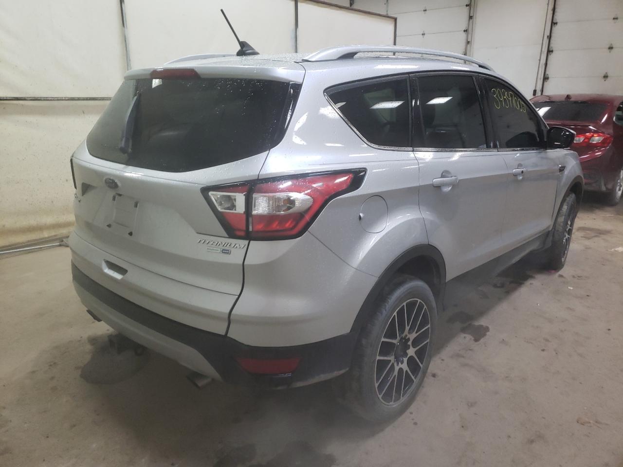 Photo 4 from auction – 2018 FORD ESCAPE TIT with VIN 1FMCU9J92JUA71080