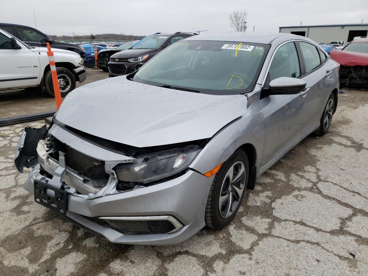Photo 2 from auction – 2019 HONDA CIVIC LX with VIN 19XFC2E69KE004097