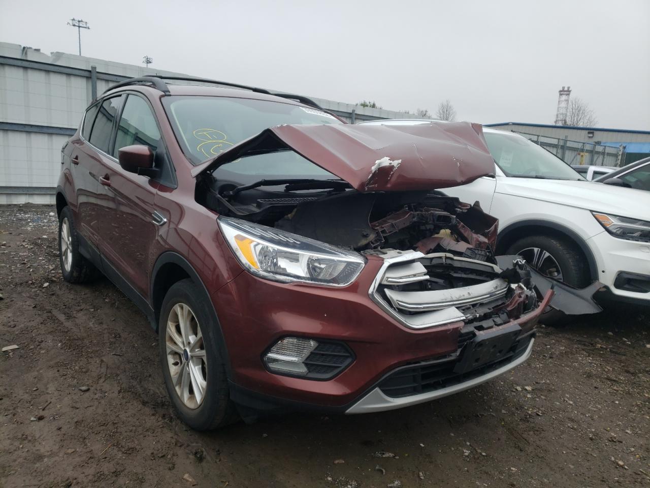 FORD ESCAPE SE 2018 with VIN 1FMCU9GD2JUC67516 - Photo from auction