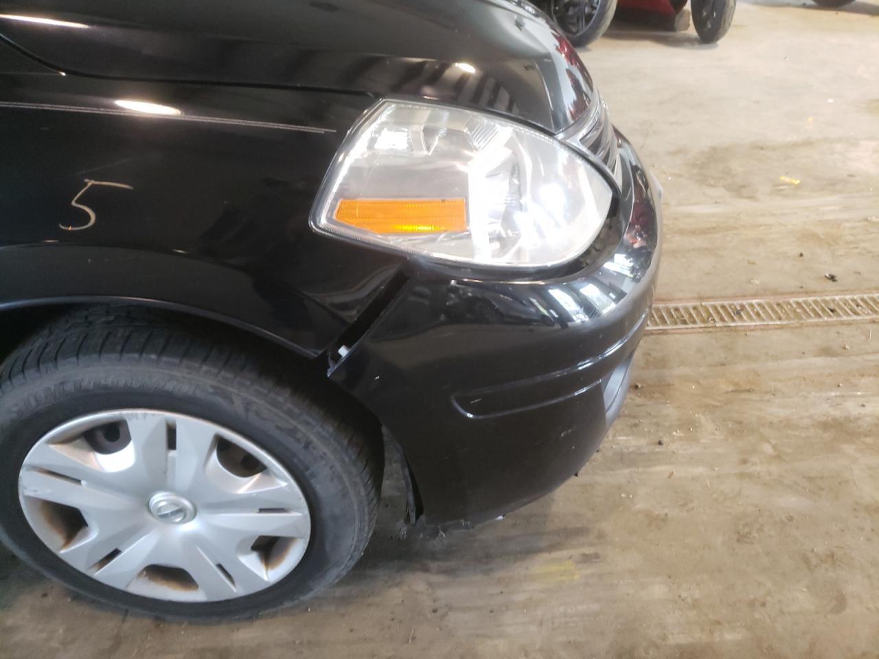 Фото 9 с аукциона – 2011 NISSAN VERSA S с VIN 3N1BC1CP7BL398282