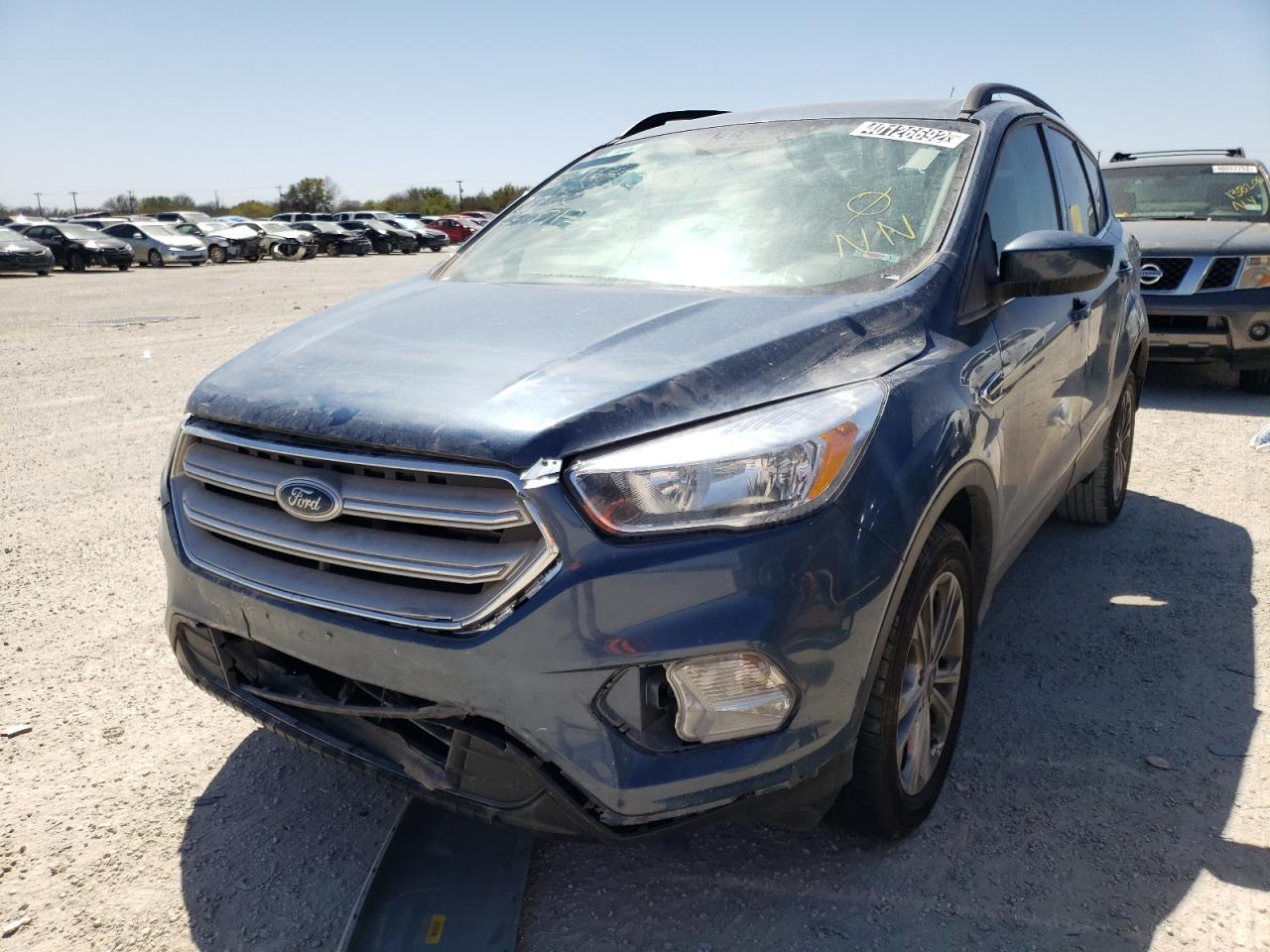 Photo 2 from auction – 2018 FORD ESCAPE SE with VIN 1FMCU0GD0JUC94712