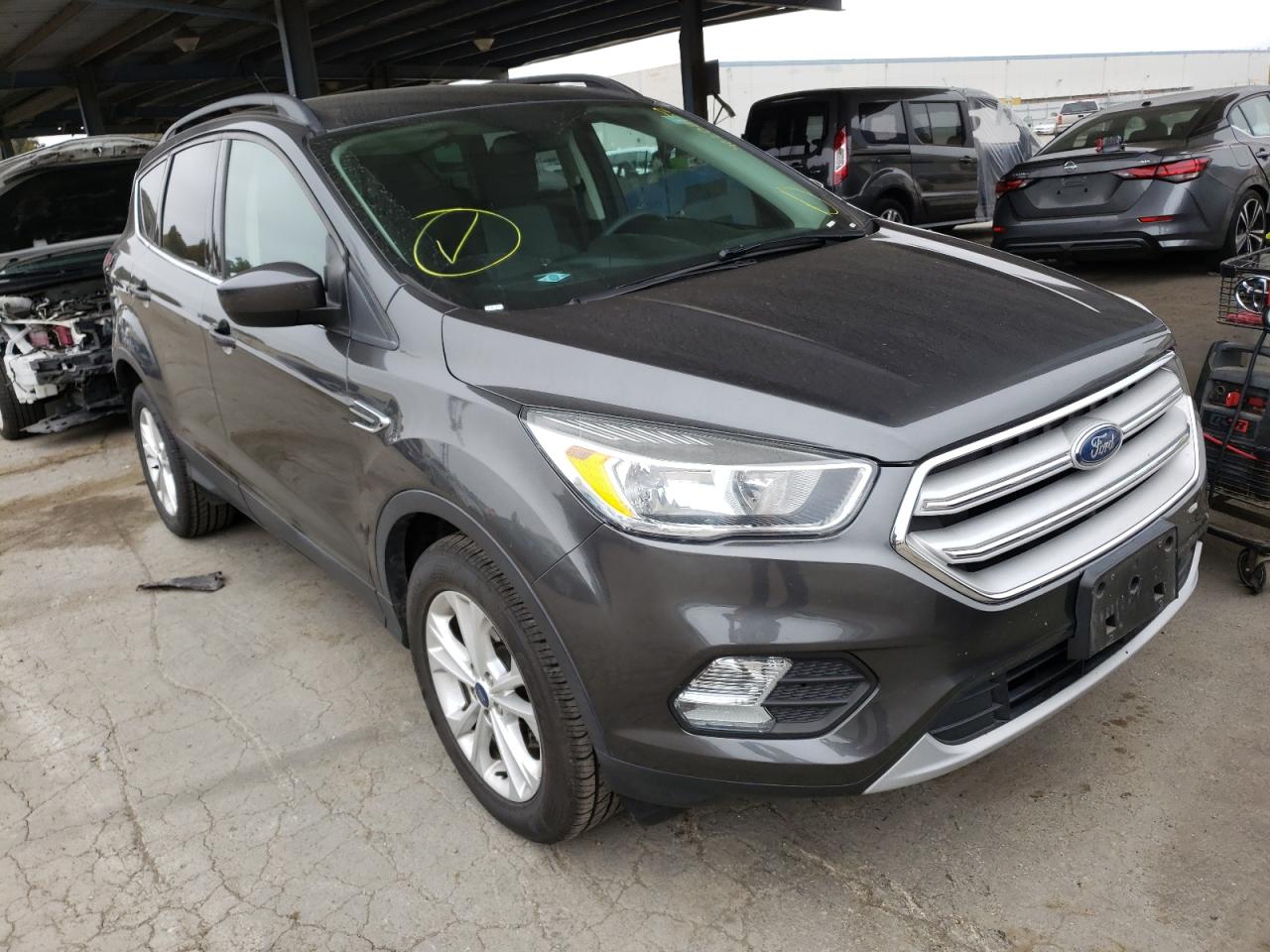 FORD ESCAPE SE 2018 with VIN 1FMCU0GD2JUA72124 - Photo from auction