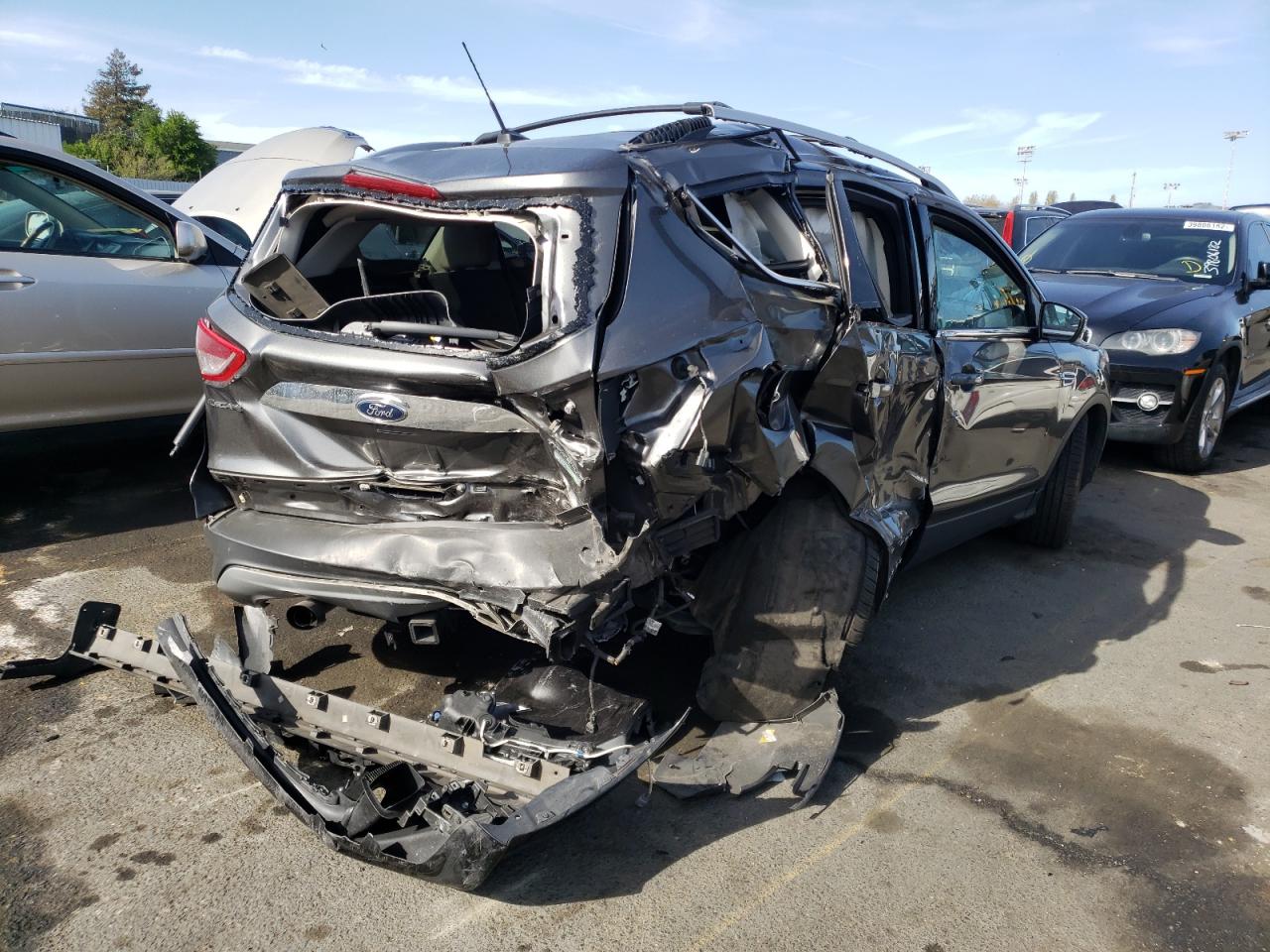 Photo 4 from auction – 2016 FORD ESCAPE TIT with VIN 1FMCU0J98GUA22227