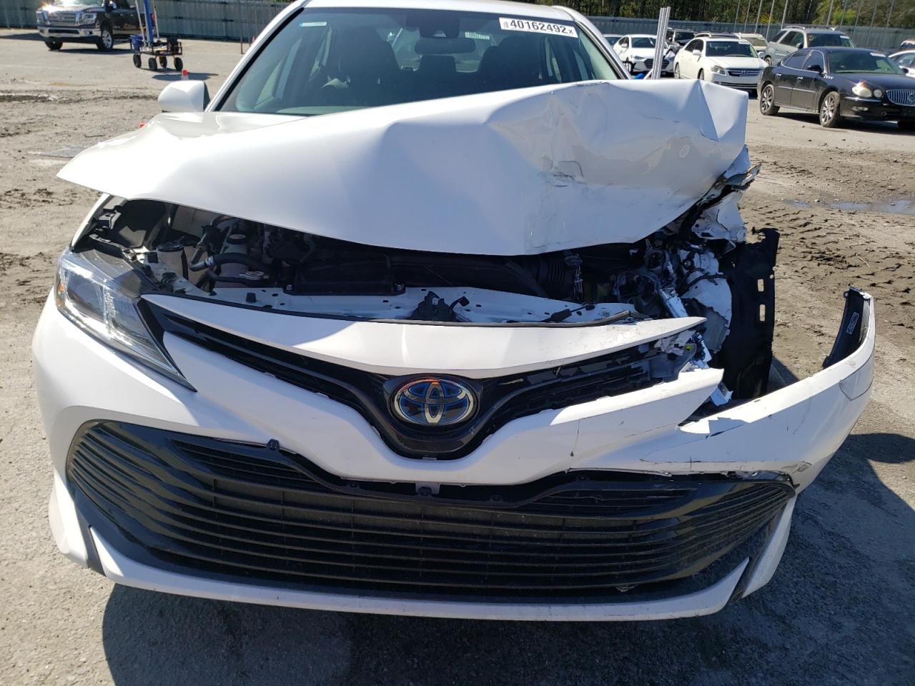 Photo 9 from auction – 2020 TOYOTA CAMRY LE with VIN 4T1C31AK3LU016597